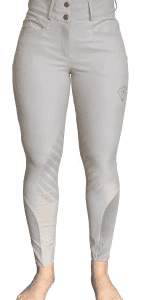 Woman wearing light grey Paragon Performance Rebecca knee patch breeches for riding.