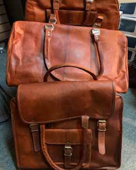 Leather travel bags and accessories for equestrians and horse lovers.